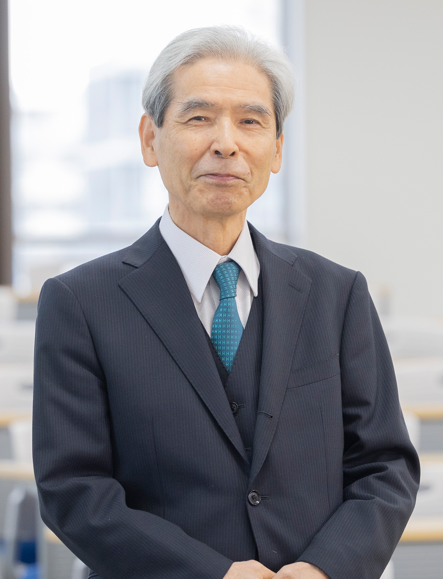 学校法人本山学園理事長／経済学博士 室山 義正